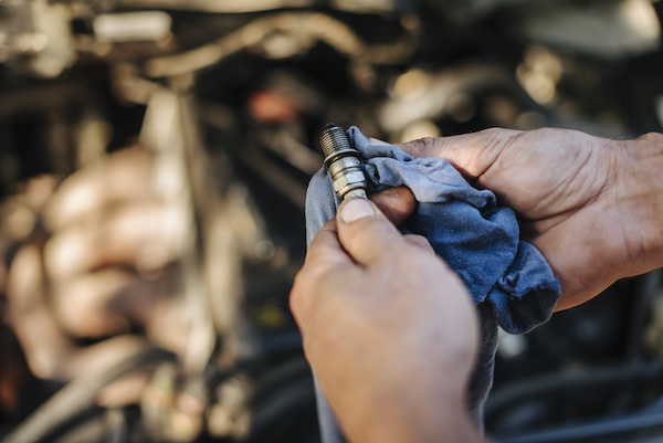Auto Tech Services of Rochester - SIGNS YOU NEED TO REPLACE SPARK PLUGS - Image 1